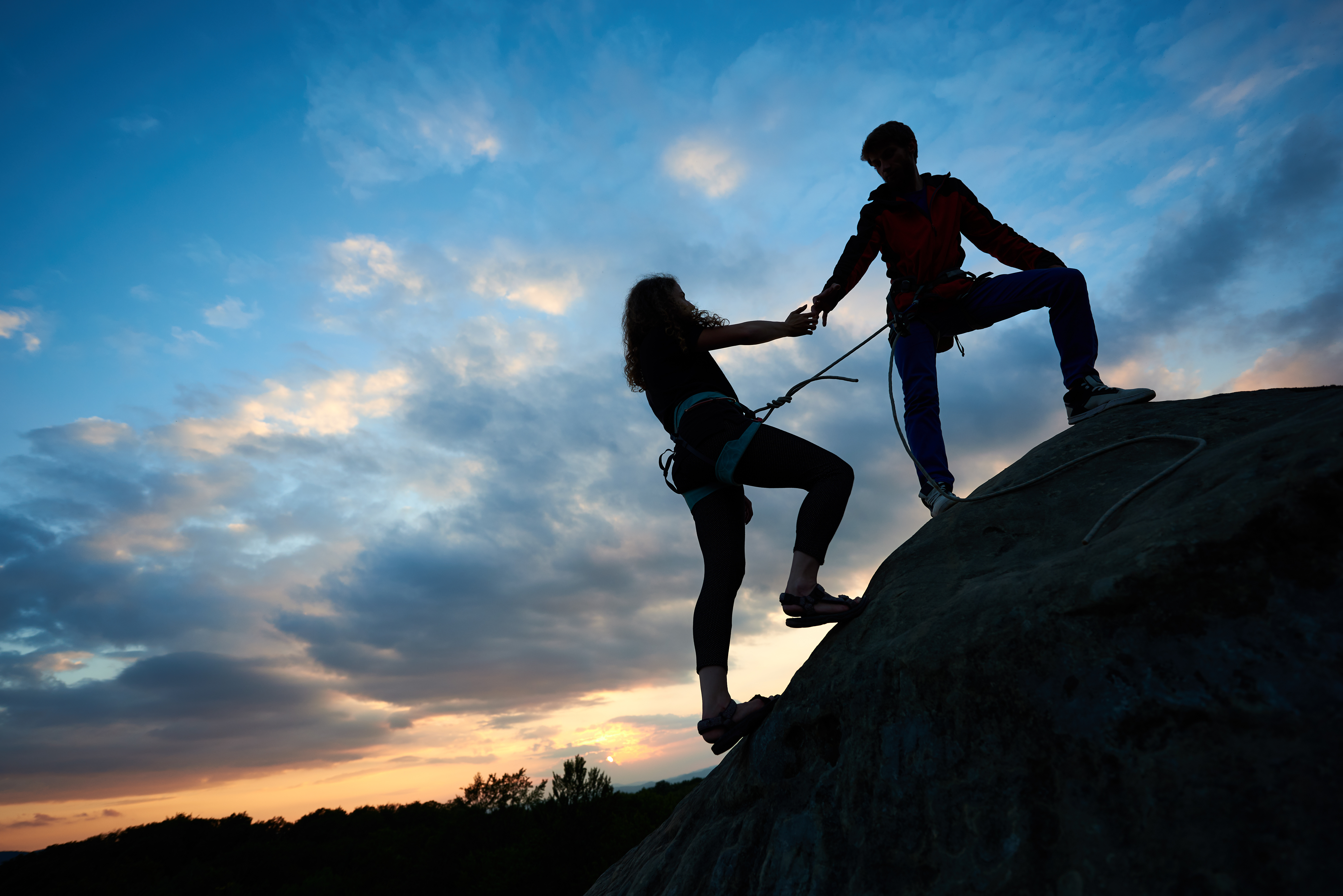 A couple out climbing